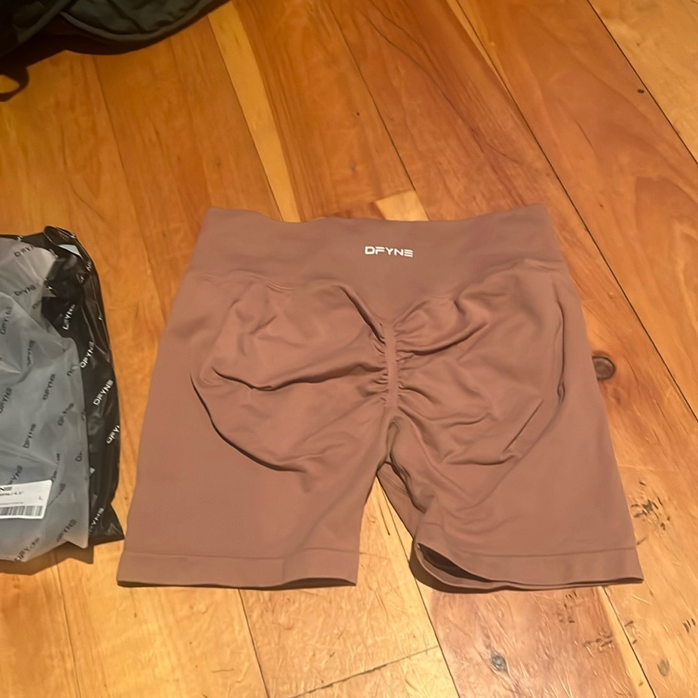 Define impact shorts-size L- color dust Rose. Brand new never worn